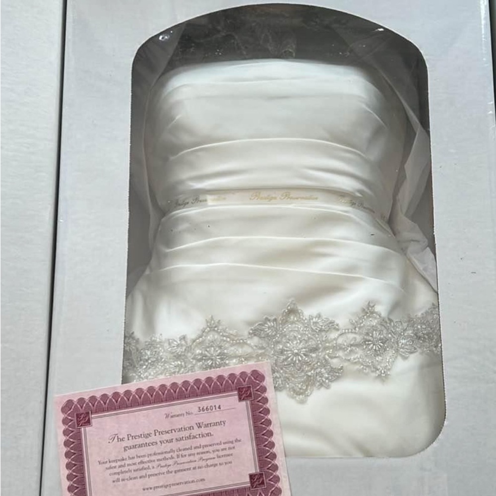 Oleg Cassini Elegant off white  Wedding Dress with Silver Embellishments